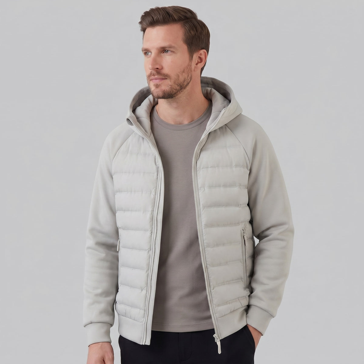 Herren Steppjacke mit Strickärmeln und Kapuze | Wieland