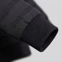 Herren Steppjacke mit Strickärmeln und Kapuze | Wieland